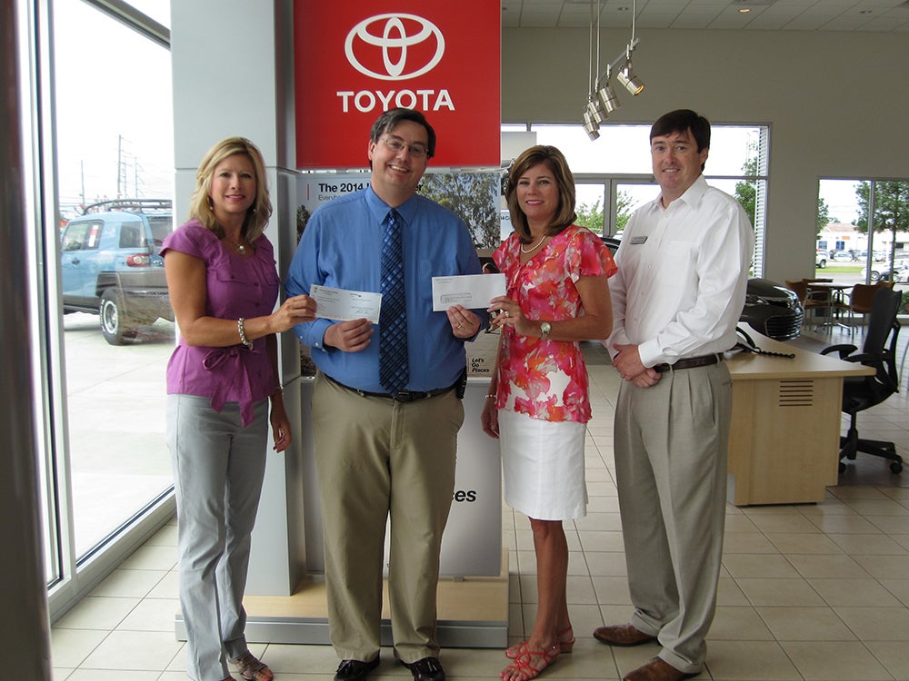 Pictured is Greg Millette, Executive Director of the United Way of South Central Georgia with Heidi Massey, Heather Stripling, and Matt Brand of Prince Toyota