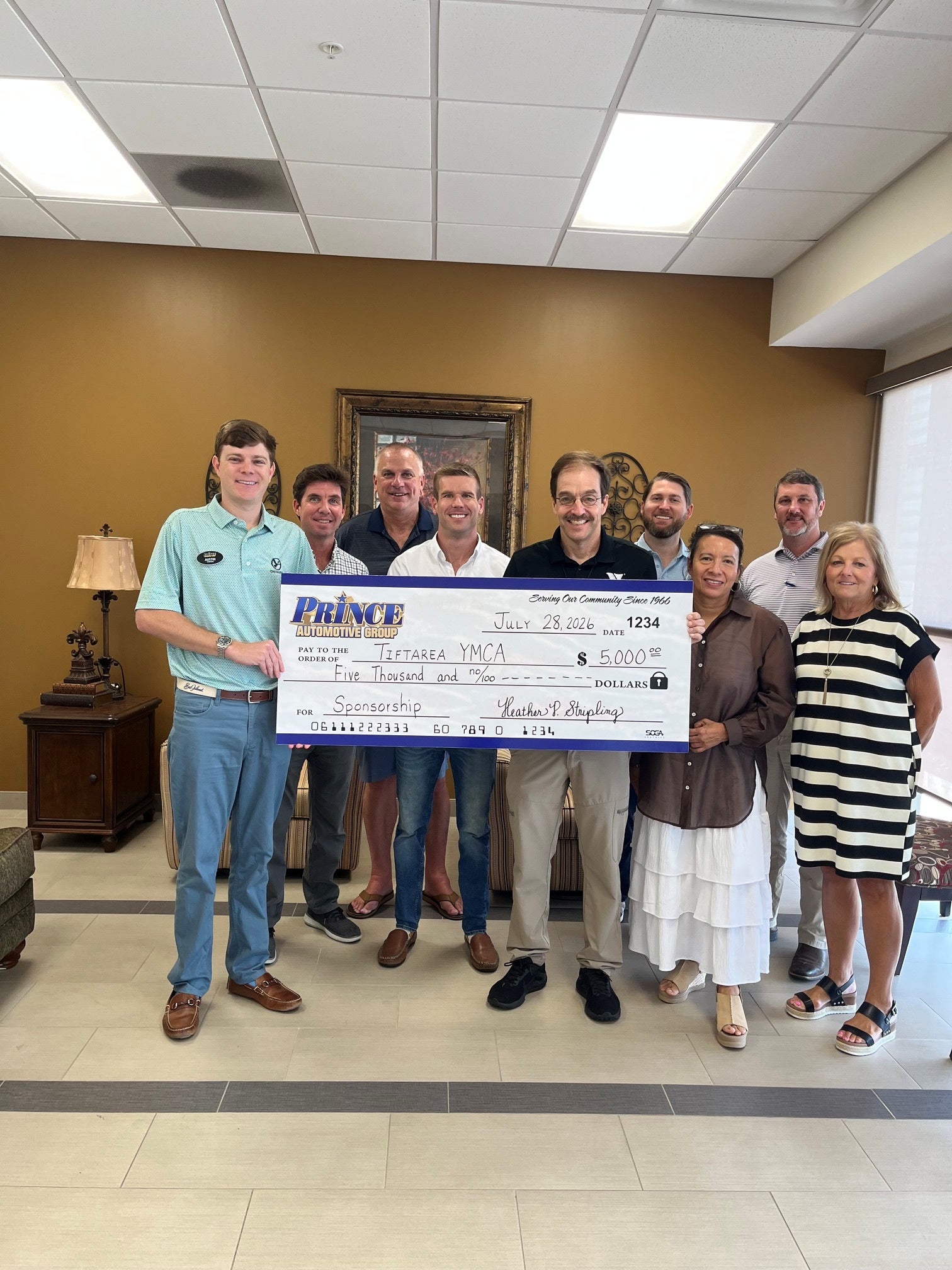 Prince Toyota giving back to the Tiftarea YMCA with YMCA Director Jason Bischoff