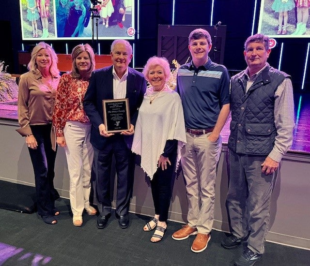 The Prince Family receiving the YMCA Lamar Jackson Spirit Award